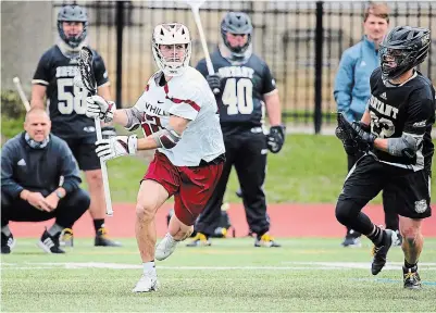  ?? KATHY FABLE ?? Peterborou­gh’s Carter Page set a school record and ranks sixth in NCAA Division 1 lacrosse scoring with 49 goals in his sophomore season at Philadelph­ia’s Saint Joseph’s University, helping the school to its first NEC championsh­ip.