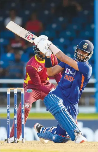  ?? Agence France-presse ?? India’s Axar Patel plays a shot during their second ODI match against the West Indies at Queens Park Oval on Sunday.