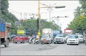  ??  ?? Vehicles at busy Adharwadi Jn. in Kalyan.