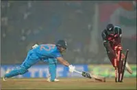  ?? (AFP) ?? India’s Ishan Kishan is run out during the second Twenty20 internatio­nal against New Zealand at the Ekana Cricket Stadium in Lucknow on Sunday.