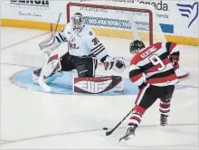  ?? JULIE JOCSAK ST. CATHARINES STANDARD FILE PHOTO ?? Austen Keating of the Ottawa 67's bears down on the Niagara net Oct. 18. The 67’s started the season 3-3-0, but have gone 18-0-4 since.