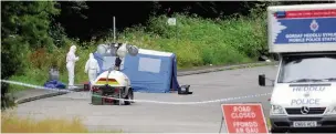  ??  ?? Forensic officers at the scene on the A4059, near Abercynon, in July 2015