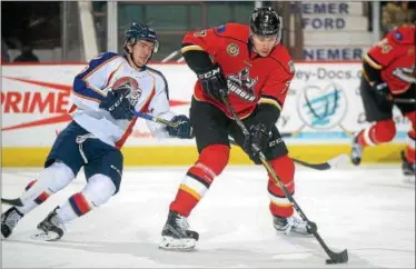  ?? PHOTO PROVIDED ?? Adirondack Thunder defenseman Stepan Falkovsky (right), seen here in a game against the Norfolk Admirals, has been named the CCM ECHL Rookie of the Month for February.