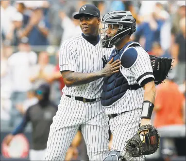  ?? Jim McIsaac / Getty Images ?? Yankees closer Aroldis Chapman, left, and Gary Sanchez celebrate after beating the Orioles 65 at Yankee Stadium on Thursday in New York.
