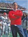  ?? UNIVERSITY OF GEORGIA PHOTO ?? Vince Dooley, Georgia’s football coach at the time, watches his players go through warmups during the Cotton Bowl matchup with Texas after the 1983 regular season. The Bulldogs won 10-9 and will face the Longhorns for the first time since that upset when the two teams collide in the Sugar Bowl on New Year’s night.