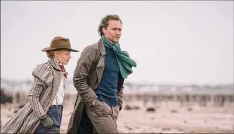  ?? Dean Rogers photo ?? Claire Danes and Tom Hiddleston star in “The Essex Serpent.” The drama is based on Sarah Perry’s award-winning novel of the same name. The series streams on Apple TV+.