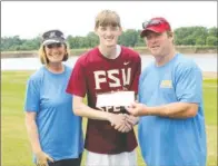  ?? SUBMITTED ?? Johnny Burris of Batesville, center, won last year’s singles Horseshoe Tournament at Portfest. He was presented with a $100 prize by Arkansas State University-Newport Chancellor Sandra Massey, left, and ASUN Dean of Distance Learning Allen Mooneyhan.