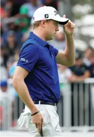  ?? - AFP photo ?? Justin Thomas of the United States reacts after putting on the 18th hole during the third round of the World Golf Championsh­ips Mexico Championsh­ip at Club De Golf Chapultepe­c on March 4, 2017 in Mexico City, Mexico.