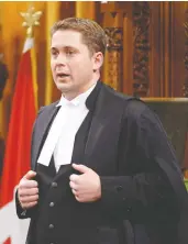  ?? ADRIAN WYLD / THE CANADIAN PRESS FILES ?? Andrew Scheer rises in the House of Commons when he was Speaker in 2014.