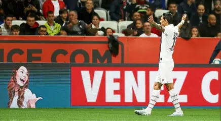  ??  ?? That’s a nice one: Paris St Germain’s Angel Di Maria celebrates scoring their first goal against Nice in their Ligue 1 match on Friday. — Reuters