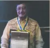  ??  ?? Cebu City Charter Day celebratio­ns included Outstandin­g Individual Awardee Dr. Warfe Engracia, shown with his plaque.