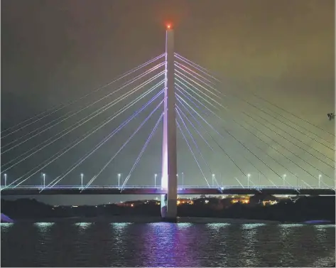  ??  ?? The Northern Spire Bridge lit up in tribute to Sunderland’s army of volunteers.