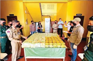  ?? ANTI-DRUG DEPARTMENT ?? Police display nearly 160kg of illegal drugs confiscate­d in Stung Treng province’s Borei O’Svay Sen Chey district, which shares its border with Laos, on January 8.