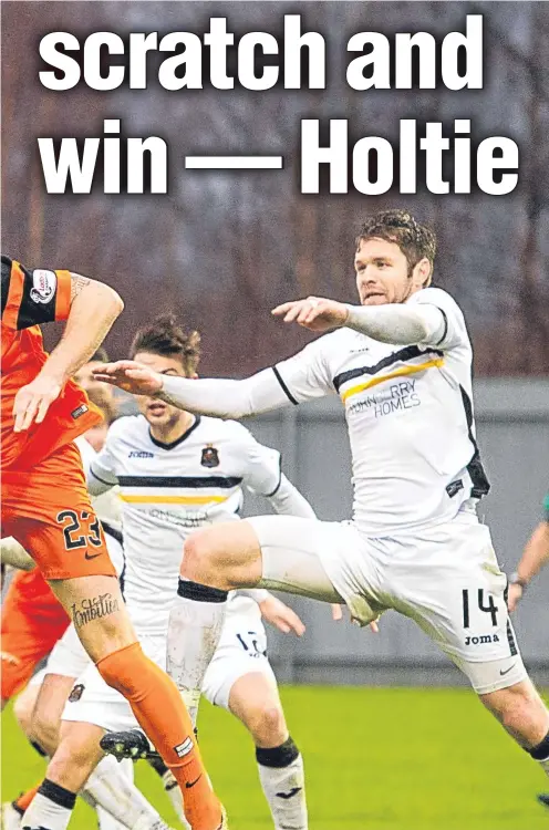  ??  ?? Dumbarton last December. “Holtie” says the Tangerines will need to scrap for every win, starting tomorrow against The Sons.