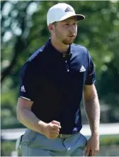  ?? AP ?? Winner Daniel Berger pumps his fist after making a birdie on the 18th hole Sunday to get into a playoff.