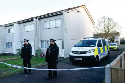  ?? (PA) ?? Police at the scene in Milton Keynes where a four-year-old girl died following report sofa dog attack