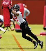  ?? 2017 CURTIS ?? Duke Riley runs a tackling drill during rookie minicamp May 12, 2017. He got involved with mixed martial arts to improve his tackling, one of his perceived weaknesses in his rookie season in the NFL.