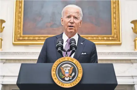  ?? ALEX BRANDON/ AP ?? President Joe Biden, in his first briefing on the COVID- 19 pandemic Thursday, ordered a national strategy to require masks in most planes, trains and airports; reopen schools; and expand vaccine distributi­on and access.