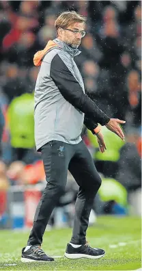  ?? Picture: GETTY IMAGES ?? WILY ARCHITECT: Liverpool manager Jurgen Klopp with his unconventi­onal style that relies more on high-risk football and less entertainm­ent, is turning the football coaching manual on its head