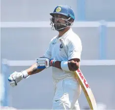  ?? Picture: AAP ?? Indian batsman Virat Kohli departs after his dismissal.