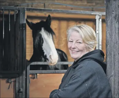  ?? PICTURE: TONY JOHNSON ?? GRATEFUL: Breast cancer survivor Catherine Meeson is now a volunteer at Equine Pathways in Gildersome, Leeds.