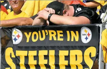  ?? Matt Freed/Post-Gazette ?? After opening the season against the Cleveland Browns — winless since 2016 — and the Chiefs at home, the Steelers have limped to a 0-1-1 start, causing fans to hang their heads.