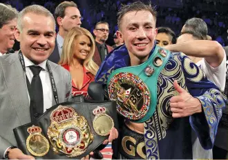  ?? AGENCE FRANCE PRESSE ?? Gennady Golovkin of Kazakhstan shows his title belts following his WBC, WBA and IBF middleweig­ht championsh­ip fight with Canelo Alvarez at the T-Mobile Arena on September 16, 2017 in Las Vegas, Nevada. Gennady Golovkin retained his three world...