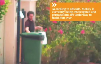  ??  ?? A screengrab from footage shared by Dubai Media Office shows an individual identified as Amir
■ Faten Mekky disposing rubbish outside a residence in Dubai.