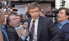  ?? COLUMBIA/SONY PICTURES ?? Presidenti­al candidate Gary Hart (Hugh Jackman) meets the press in “The Front Runner.”