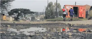  ?? PHOTO: NQUBEKO MBHELE ?? Roads such as Yarborough Road and Shorts Retreat Road in Mkondeni, Pietermari­tzburg, are some of the roads which have been severely damaged over the years.