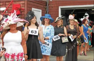  ??  ?? Ladies look their best for the 27th annual Hat Contest on Sunday at the Saratoga Race Course.