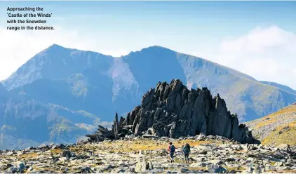  ??  ?? Approachin­g the ‘Castle of the Winds’ with the Snowdon range in the distance.