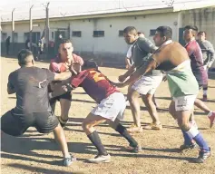  ??  ?? Inmates of the Unidad Penitencia­ria No.48 of San Martin, a prison outside of Buenos Aires, Argentina, take part in the Espartanos rugby team’s weekly training in this June 6 file photo. — AFP photo