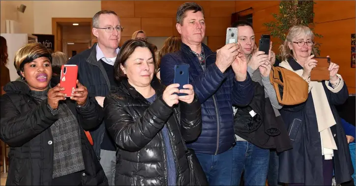  ??  ?? Proud parents and teachers get their pictures at the Brigid of Faughart 2020 Art Competitio­n held in An Táin.