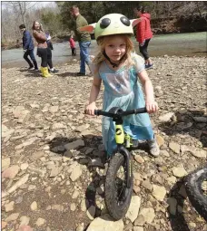  ?? Flip Putthoff/NWA Democrat-Gazette ?? Margaret Brennfoerd­er, 4, shows off her Yoda helmet.