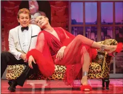  ??  ?? Partridge with Adrian Zmed, left, in La Cage Aux Folles