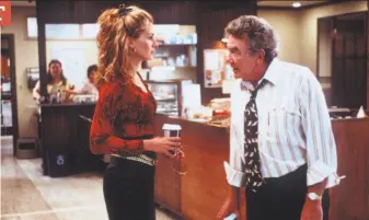  ?? Bob Marshak / Universal Studios 2000 ?? In “Erin Brockovich,” a file clerk (Julia Roberts) lays the groundwork for a class-action lawsuit by a small-time attorney (Albert Finney). Roberts won an Oscar as best actress in 2001.