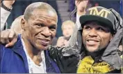  ?? Rick Bowmer
Associated Press ?? FLOYD MAYWEATHER SR. returned as his son’s trainer before a 2013 win over Robert Guerrero.