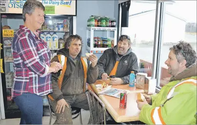  ?? SHARON MONTGOMERY-DUPE/CAPE BRETON POST ?? Donna Marie Young, from left, an employee at Kace Gas and Convenienc­e at Dearns Corner on the Donkin-Morien Highway, chats with contractor­s working at the Donkin mine — Dave Pelrine of All Steel Builders in Port Hawkesbury, Marcel Gaigneur of Paul...