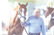  ?? - AFP photo ?? US racing legend Bob Baffert, seen here with 2018 Triple Crown winner Justify, faces fresh scrutiny after two of his horses reportedly failed drugs tests.