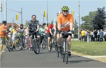  ?? JULIE JOCSAK/POSTMEDIA NEWS ?? The Niagara Region and the City of Thorold officially opened a new multi-use trail on Decew Road and Merrittvil­le Hwy on Wednesday.