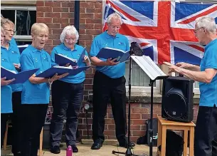  ?? ?? ●●Residents, staff and family enjoying the Haslingden Hall and Lodge Jubilee Party which included songs from the Veterans in Communitie­s choir