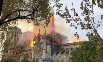  ??  ?? Seconds before collapse: this phot was taken seconds before the cathedral’s famous spire collapsed.