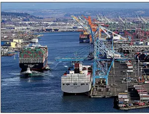  ?? AP ?? A container ship heads into the Port of Tacoma, Wash., last week U.S. Trade Representa­tive Robert Lighthizer said Tuesday of U.S. and Chinese trade negotiatio­ns, “We’re working more or less continuous­ly.”