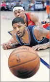  ?? PHOTO/TYLER KAUFMAN] [AP ?? Thunder forward Paul George, front, and Pelicans guard Tim Frazier watch the ball go out of bounds during New Orleans' 131-122 win Thursday.