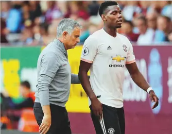  ?? Reuters ?? Manchester United’s Paul Pogba with manager Jose Mourinho. Pogba has endured a turbulent two years since returning to Old Trafford for a then world-record fee of €105 million (Dh447 million).