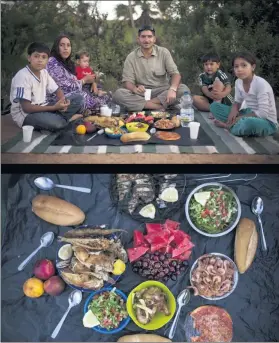  ?? SANTI PALACIOS / ASSOCIATED PRESS ?? A Syrian refugee family wait to break their fast during the holy month of Ramadan, near the Temporary Center for Immigrants in Melilla, Spain. Below is a close-up of their meal.