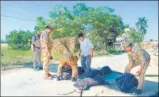  ?? PTI ?? Police recreate the sequence of events leading to the incident in Lakhimpur Kheri as part of their probe, on Thursday.