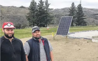  ?? PHOTO: ALEXIA JOHNSTON ?? Looking to the future . . . Turf student David Reinds (left) and programme coordinato­r and lecturer John Prunnell are among those working to establish wetlands to manage leachates from a closed landfill using lined ponds and riparian plantings.