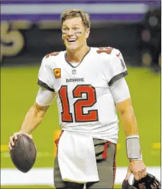  ?? Brett Duke The Associated Press ?? By signing Tom Brady, Tampa Bay got the “missing piece,” according to coach Bruce Arians after the Bucs won the Super Bowl.